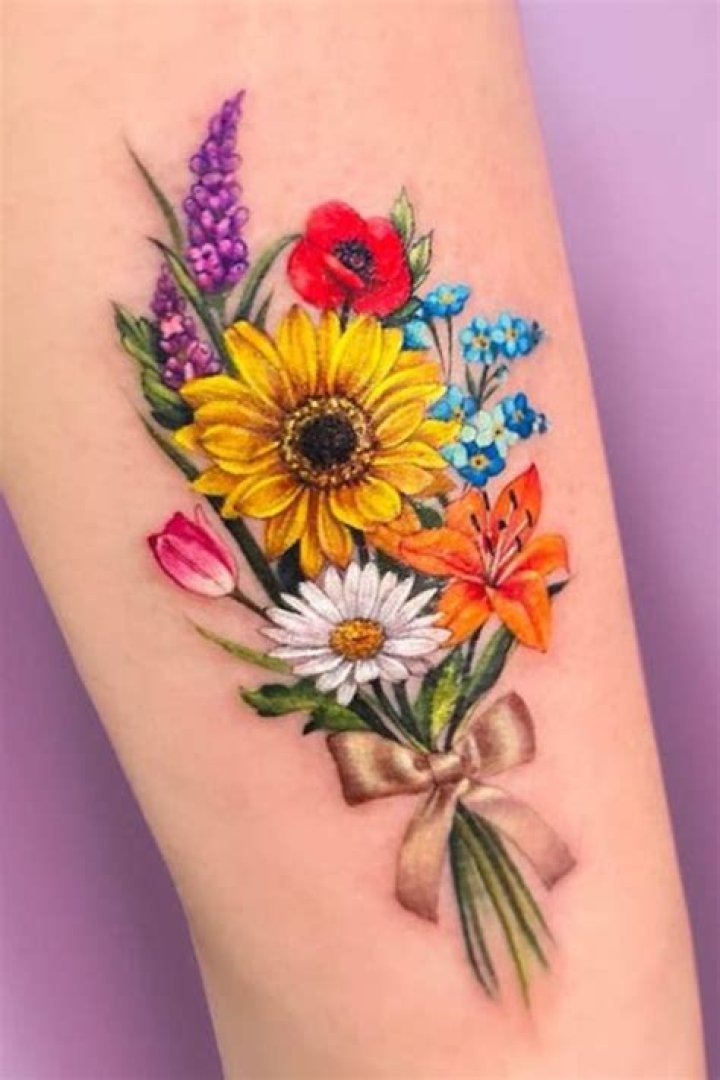 Unveil The Beauty And Meaning Of Daisy Bouquet Tattoos
