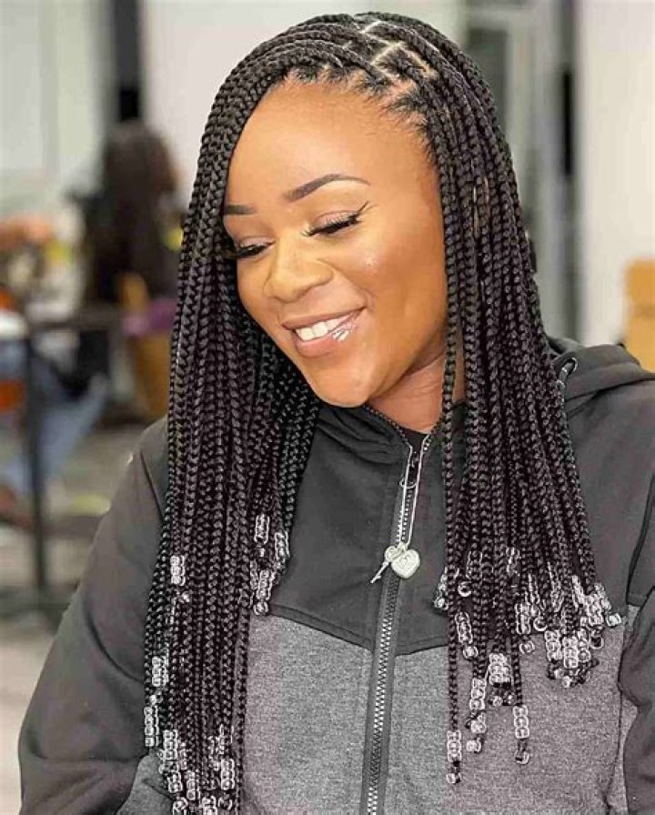 Unveiling The Allure Of Short Beaded Knotless Braids For Adventurous Souls